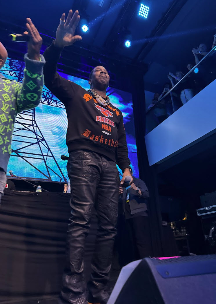 Busta Rhymes performing at SEO Week 2025