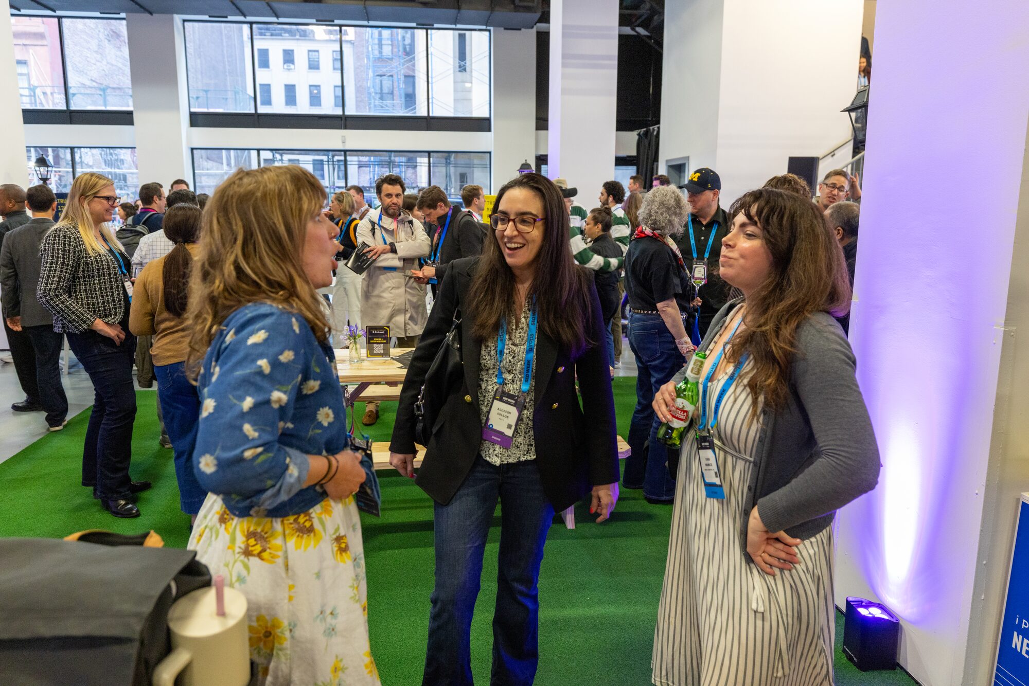 Attendees in conversation during a networking break