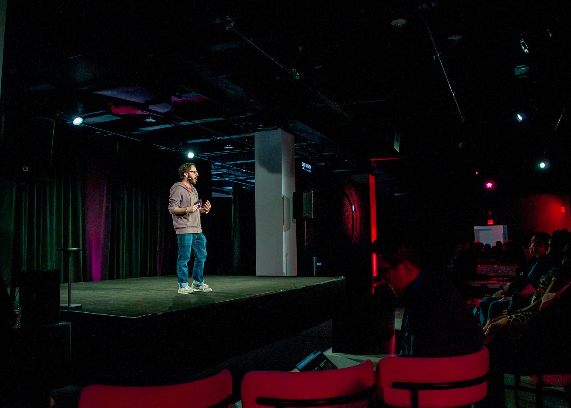 Speaker giving a talk on the main stage